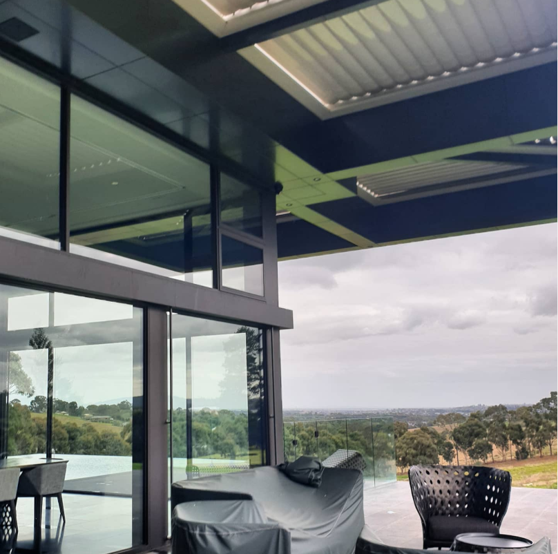 Clean glass facade with panoramic countryside view