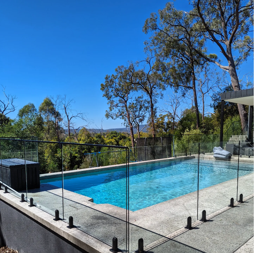 Crystal clear glass pool fence overlooking the bushland